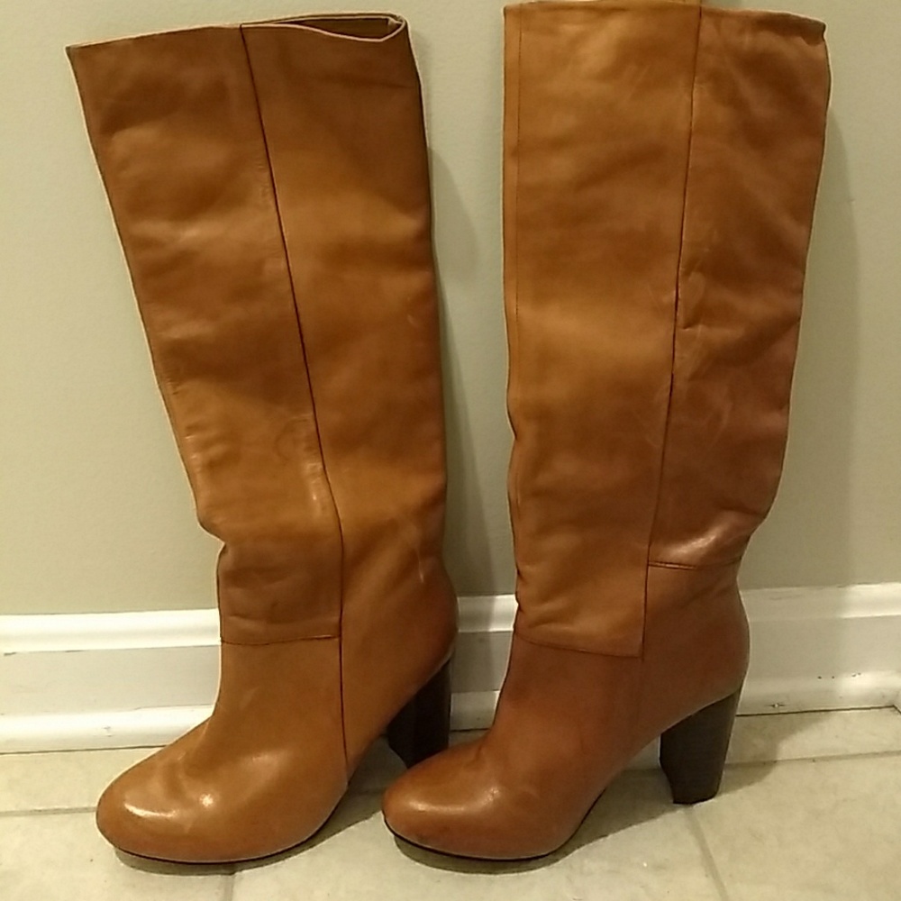 Tall leather high heel boots